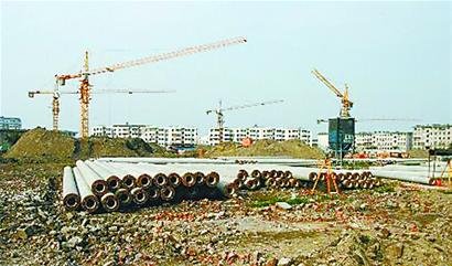 国务院酝酿修改法律 规范集体土地征收补偿(图)